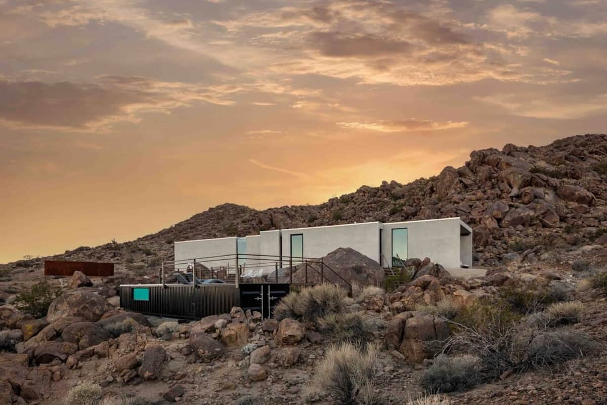 Prism modern house on hilltop surrounded by boulders, one of the best Airbnbs in Joshua Tree, California