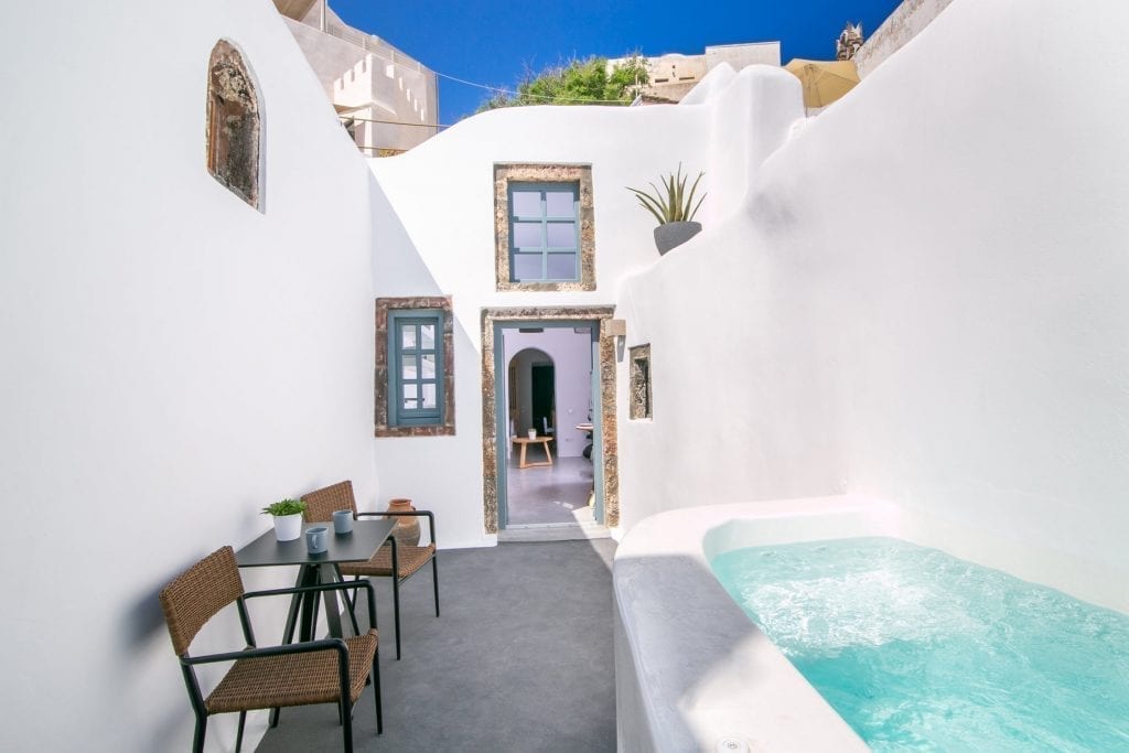 Private heated jacuzzi in the courtyard of Demeter Cave House, Pyrgos Santorini