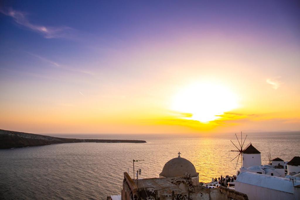 Sunset over the Aegean Sea from Thetis Cave Houses, Oia Santorini
